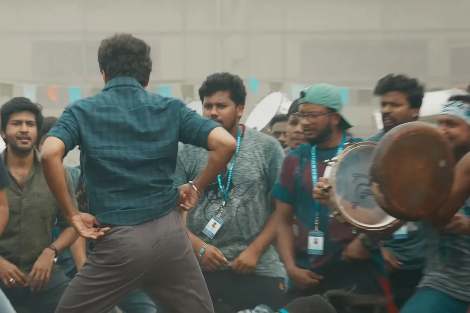 Vijay — Mid-step from the back: the short sleeve and where the shoulder seam falls