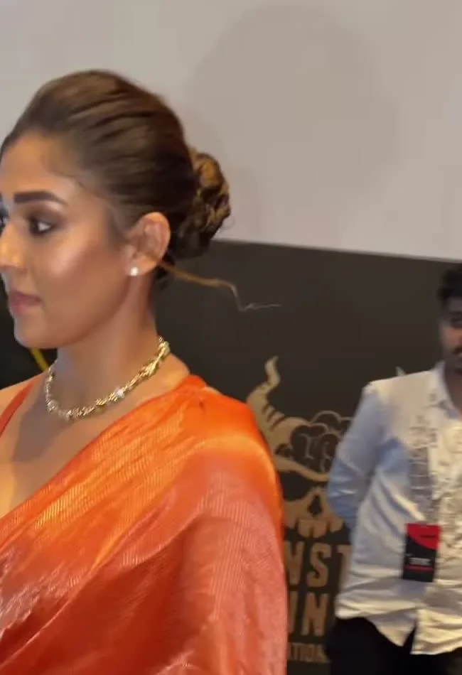 The burnt-orange plain silk saree — Nayanthara