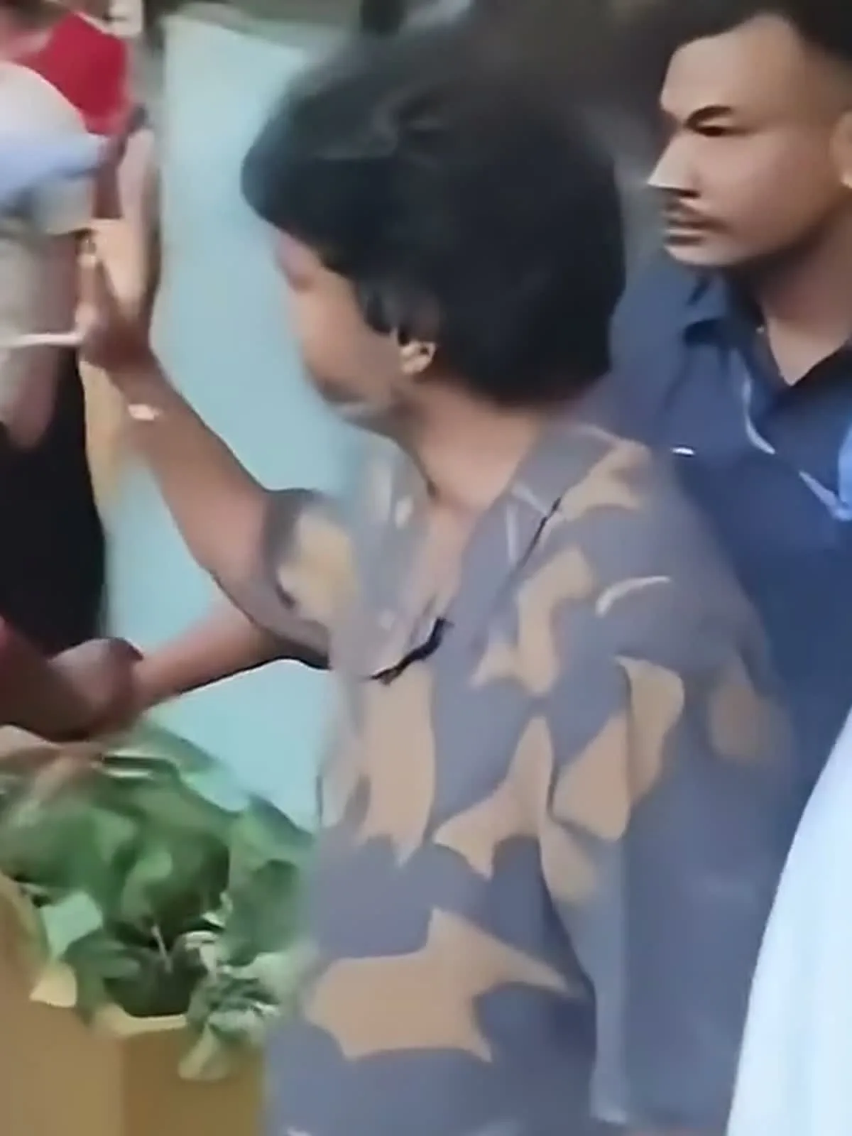 Vijay — The same shirt in daylight, leaving the mall: this is the colour the brand photography agrees with