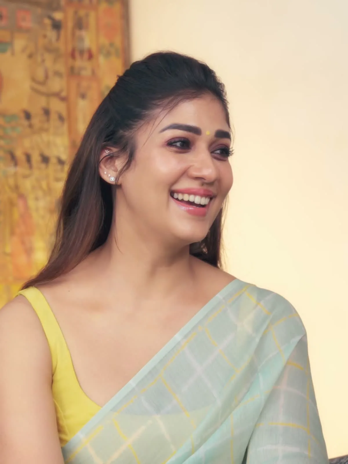 The mint windowpane-check saree and mustard blouse — Nayanthara