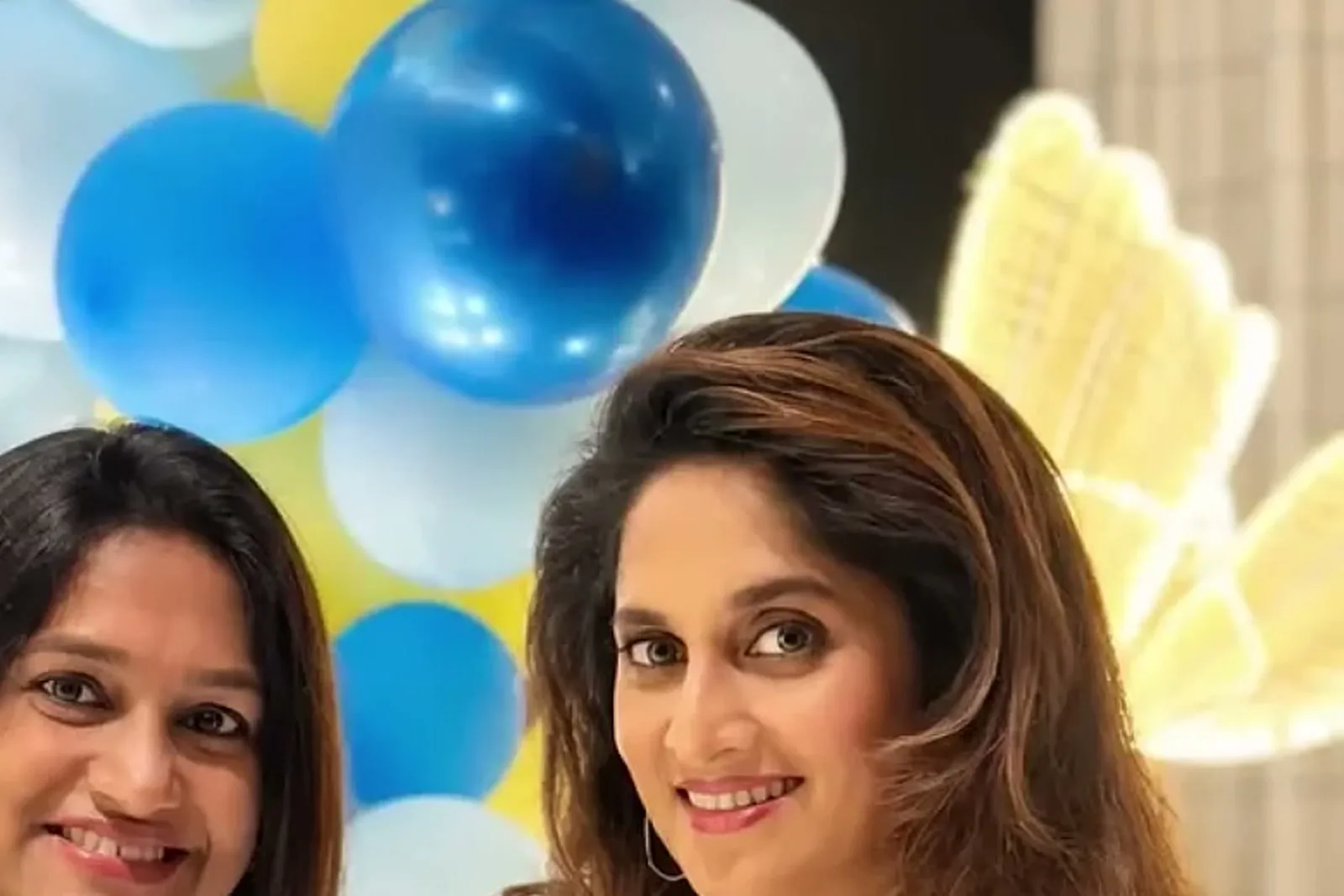 Shalini Ajith — Where it was worn — the baby-shower backdrop behind her