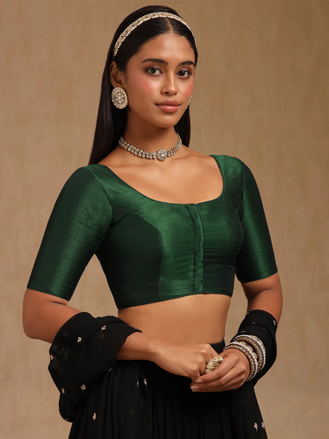 Soch Our pick under ₹1,200 — plain green U-neck blouse, short sleeves