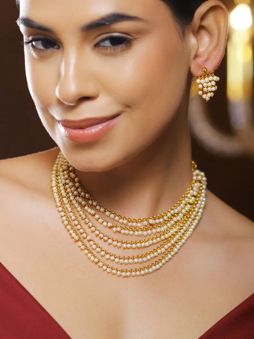 Rubans Seven-strand gold-and-pearl multi-layer necklace with earrings
