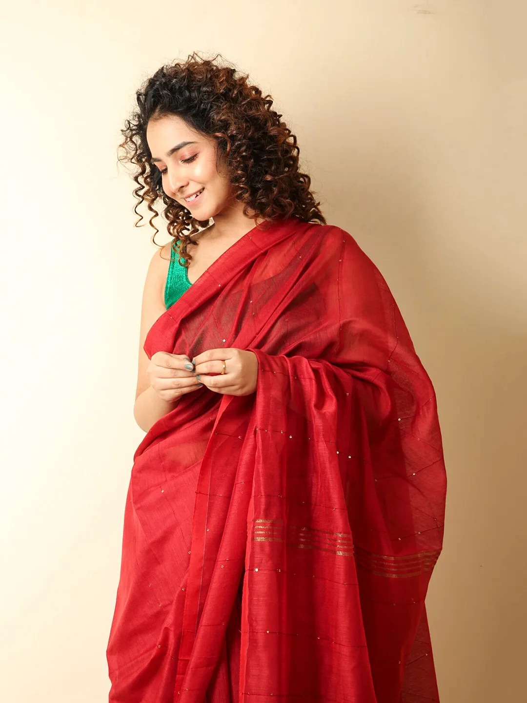 Charukriti Our pick under ₹900 — plain red pure-cotton saree, blouse piece included