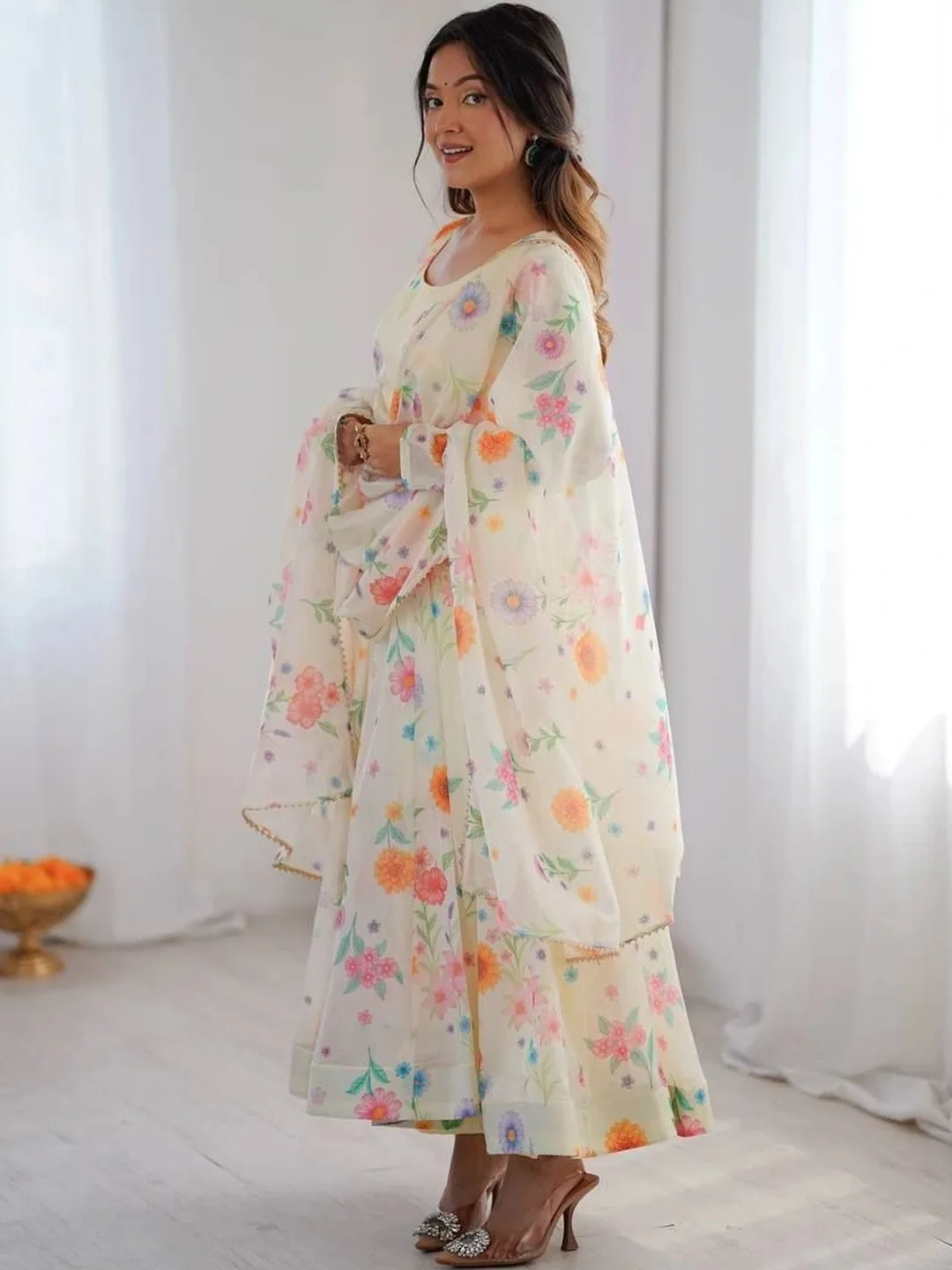 Kurtibella Our second pick under ₹2,000 — off-white printed anarkali with trousers and dupatta
