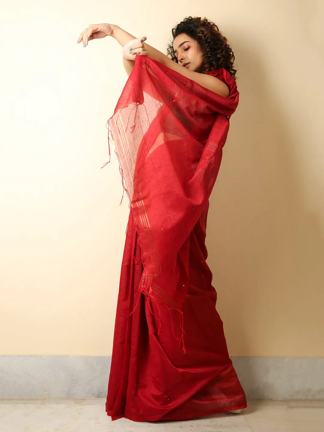 Charukriti Our pick under ₹900 — plain red pure-cotton saree, blouse piece included