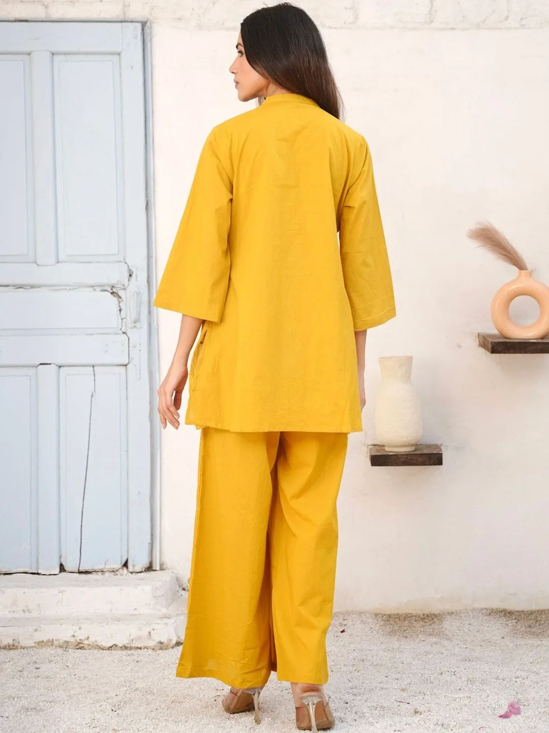 GULABI DORI Our pick under ₹2,300 — mustard kurti and palazzo set with ivory trim