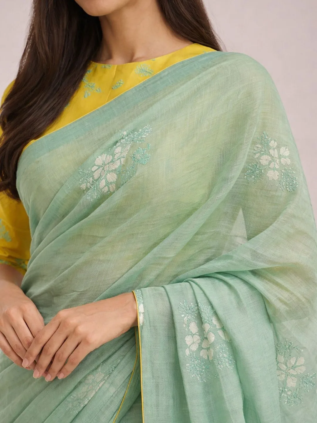 AWRIYA Our pick under ₹1,400 — sheer sea-green pure-cotton saree, blouse piece included