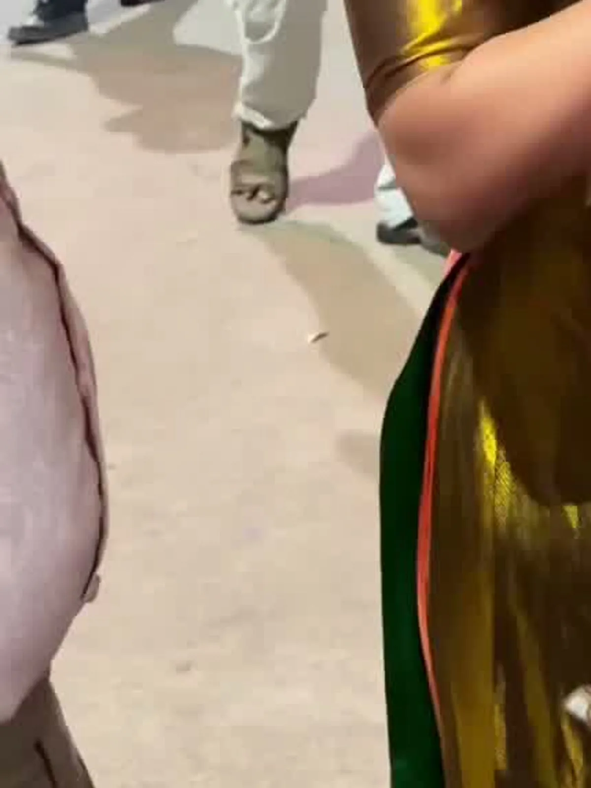 Keerthy Suresh — The side slit — parrot-green lining under the gold
