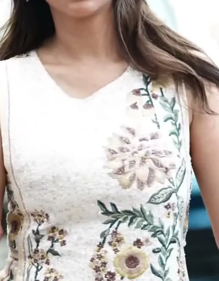Aditi Rao Hydari — Close on the embroidery: the dahlia-style blooms, daisy florals and sage fern sprigs, raised resham with a scatter of sequins