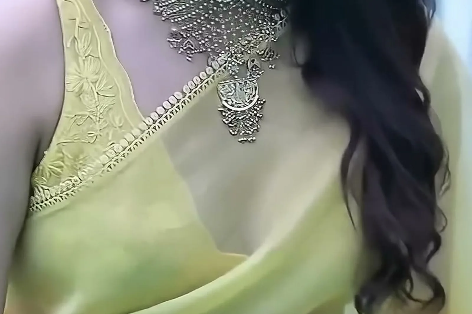 Keerthy Suresh — The blouse panel: tonal floral thread on the shoulder, and the second strand of the necklace over the pallu