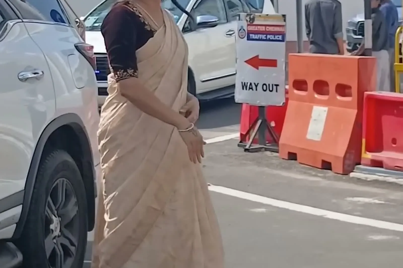 Kanimozhi Santhosh — From behind — the pallu straight over the left shoulder, no pleating at the edge