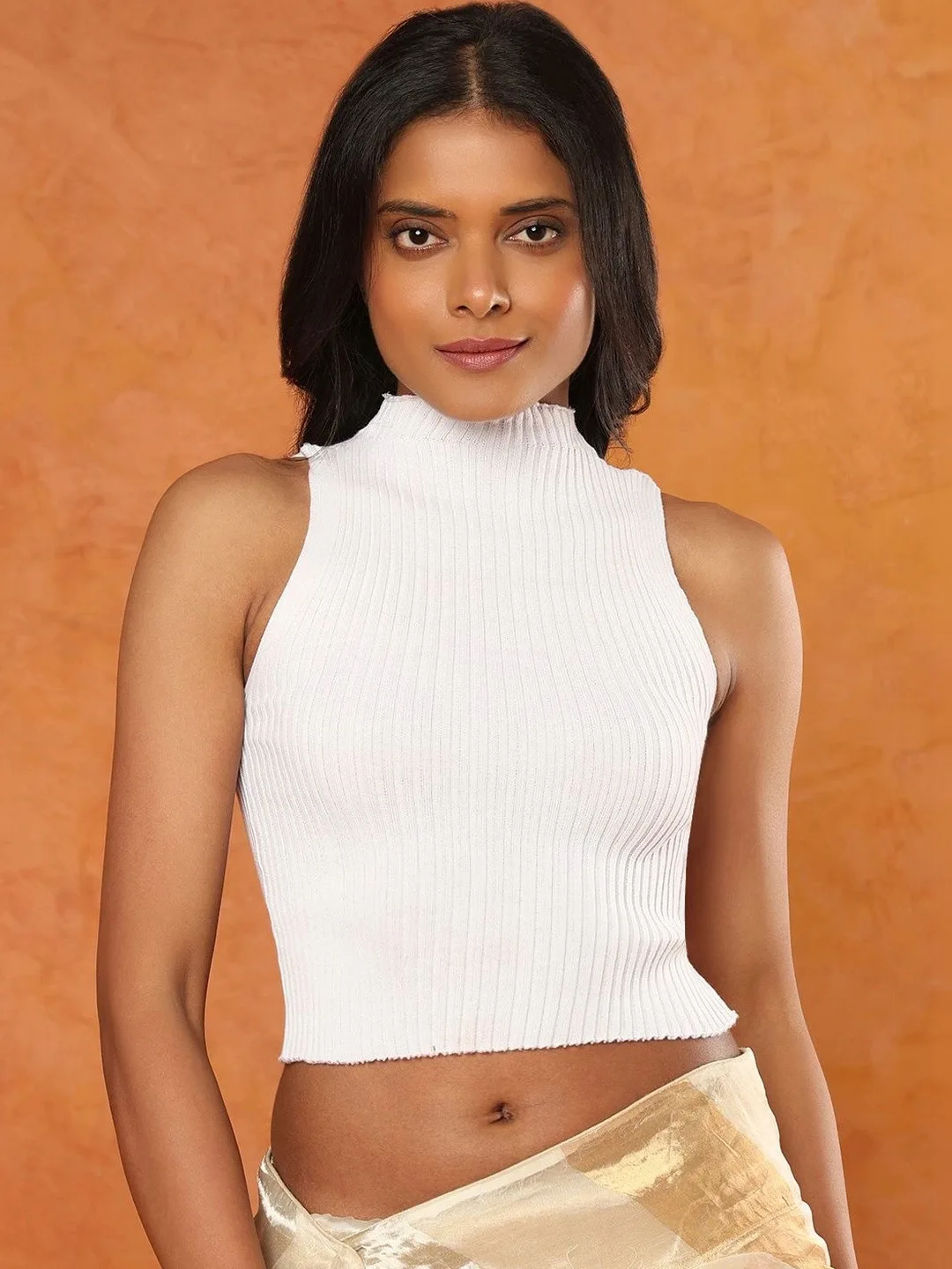 Sleeveless high-neck blouse