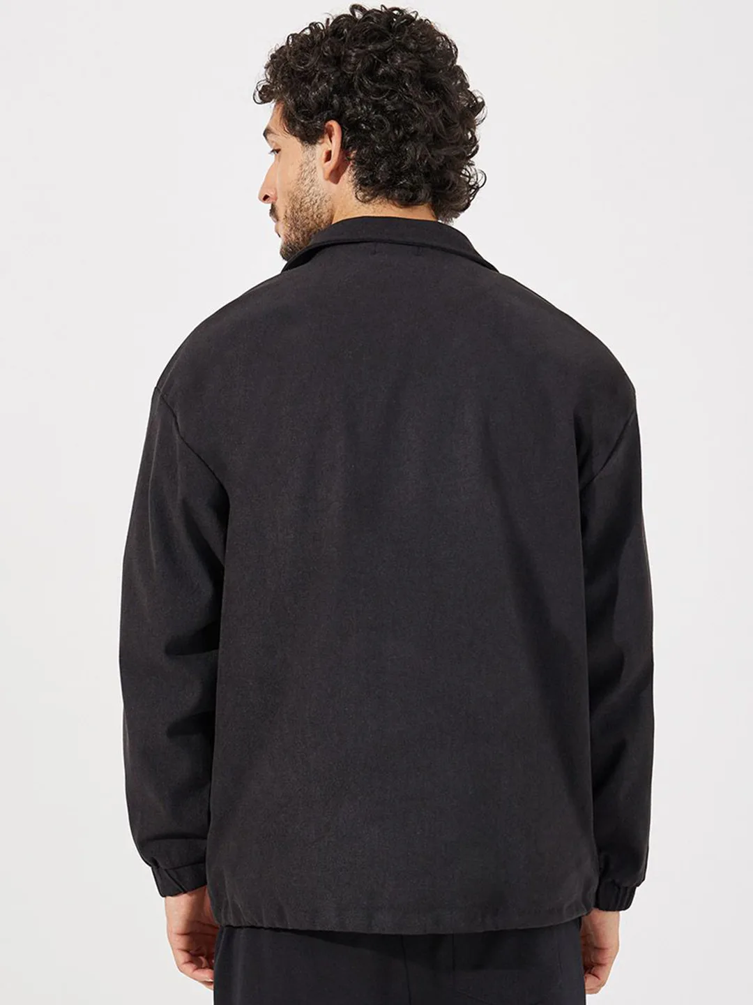 Styli Black coach jacket with cream contrast tape