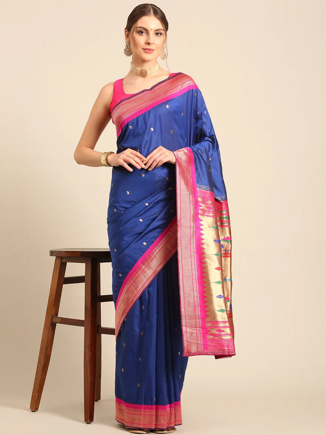 Royal Rajgharana Saree Royal blue silk saree with a pink zari border
