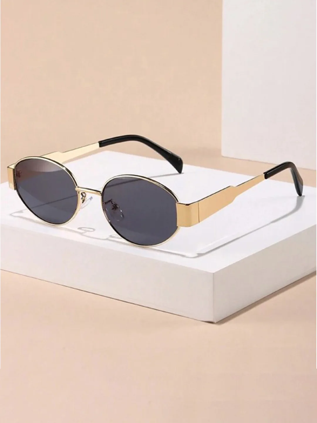 HAYDEN haiza Small oval sunglasses, dark lens