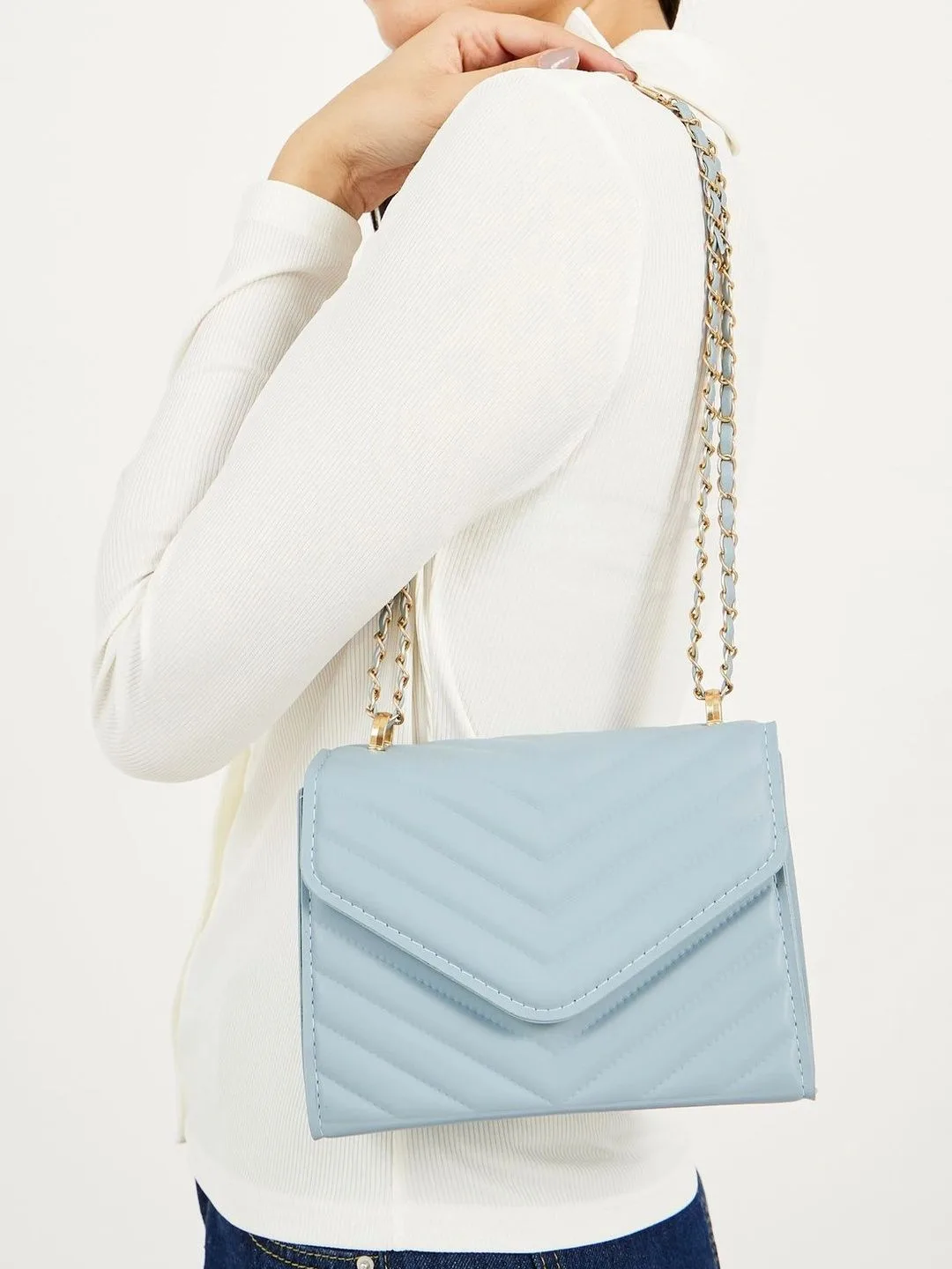 Styli Pale blue chevron-quilted chain bag
