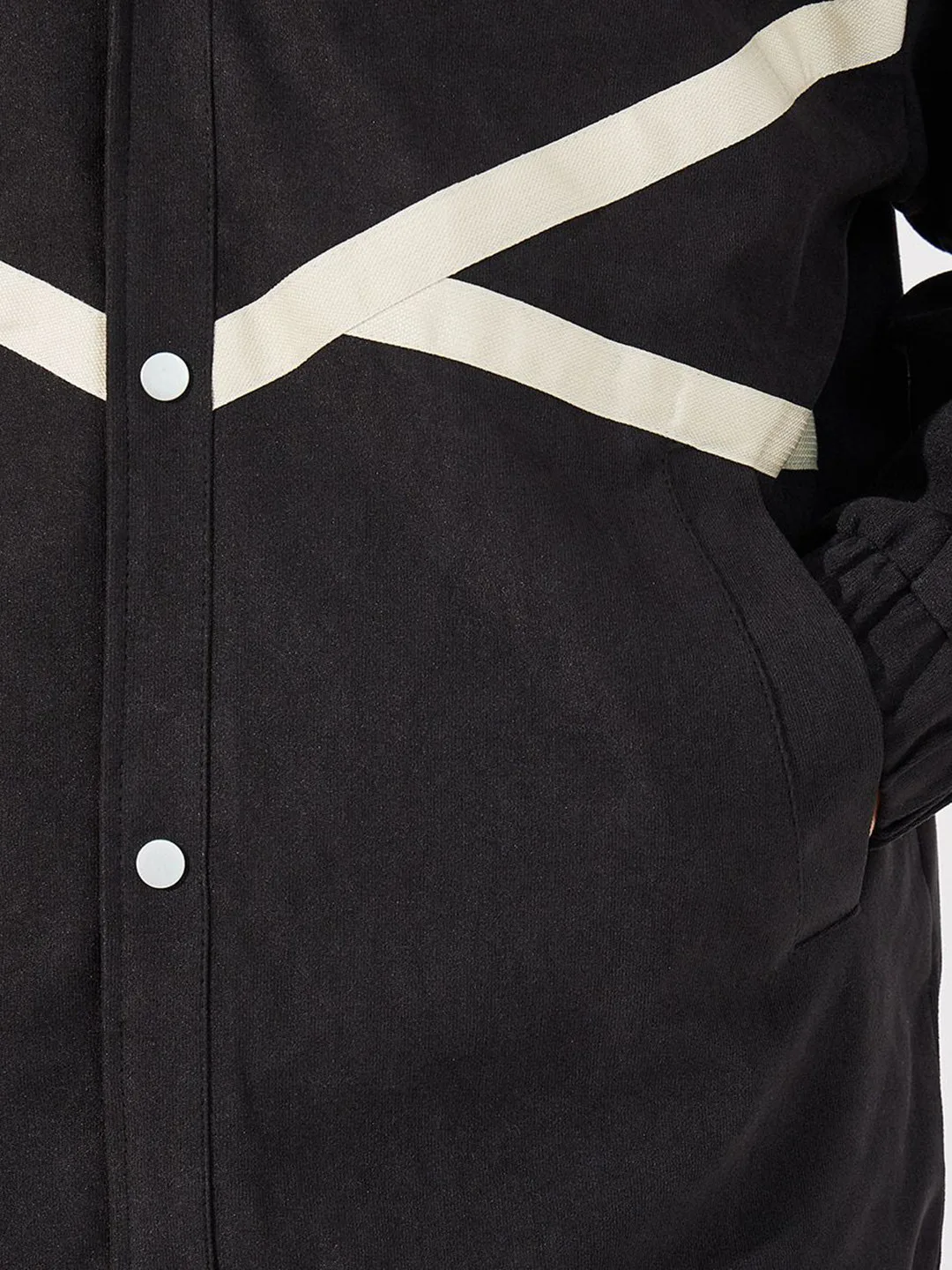 Styli Black coach jacket with cream contrast tape