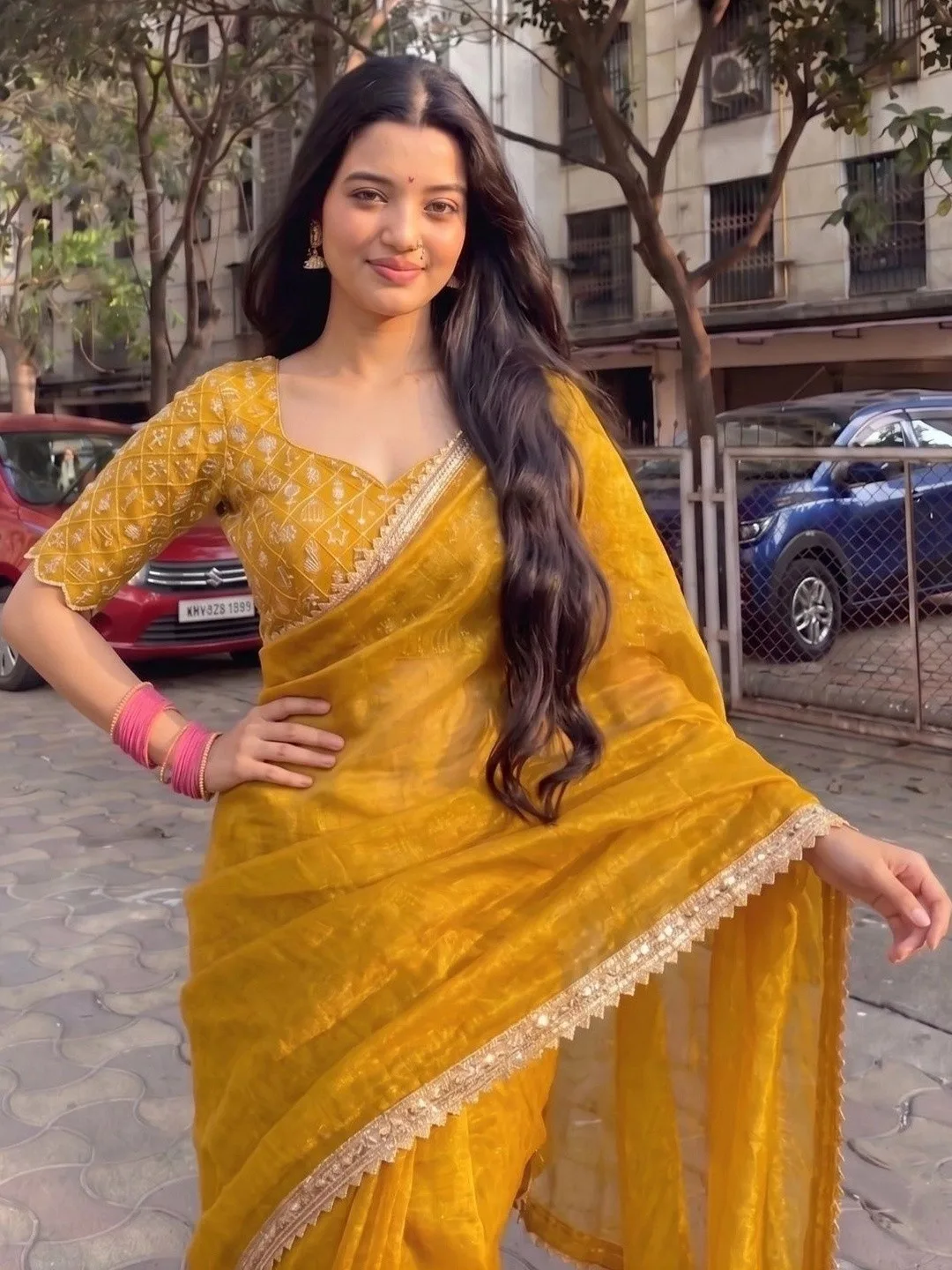 Our pick under ₹750 — sheer yellow organza saree with a scalloped gold edge