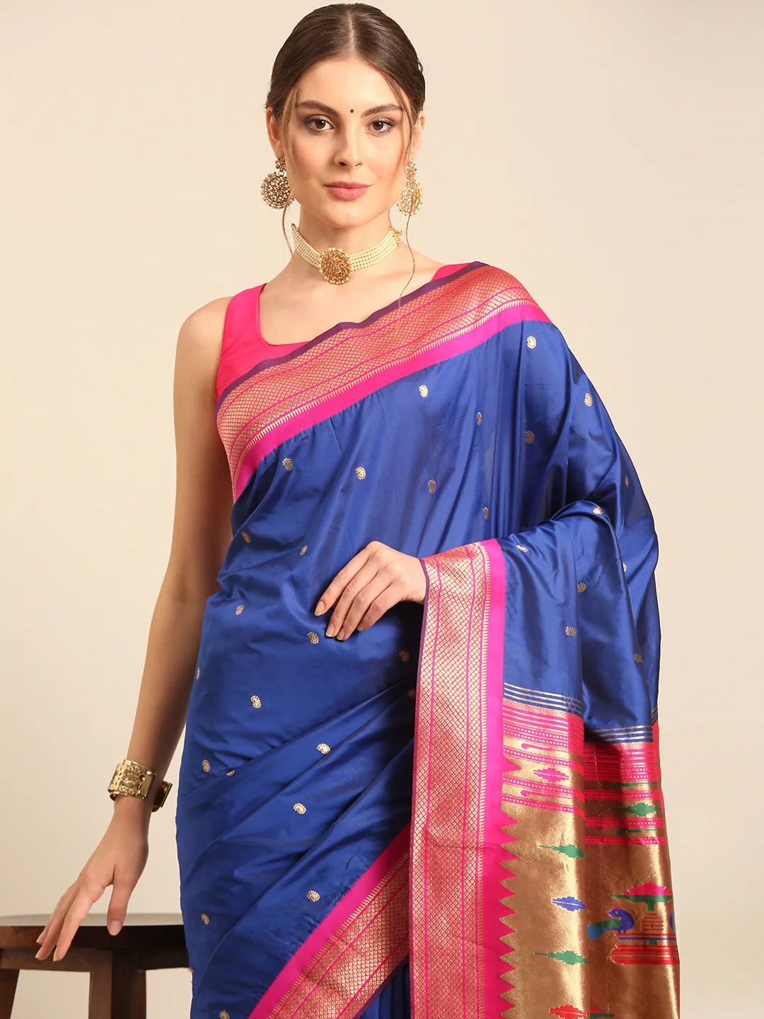Royal Rajgharana Saree Royal blue silk saree with a pink zari border