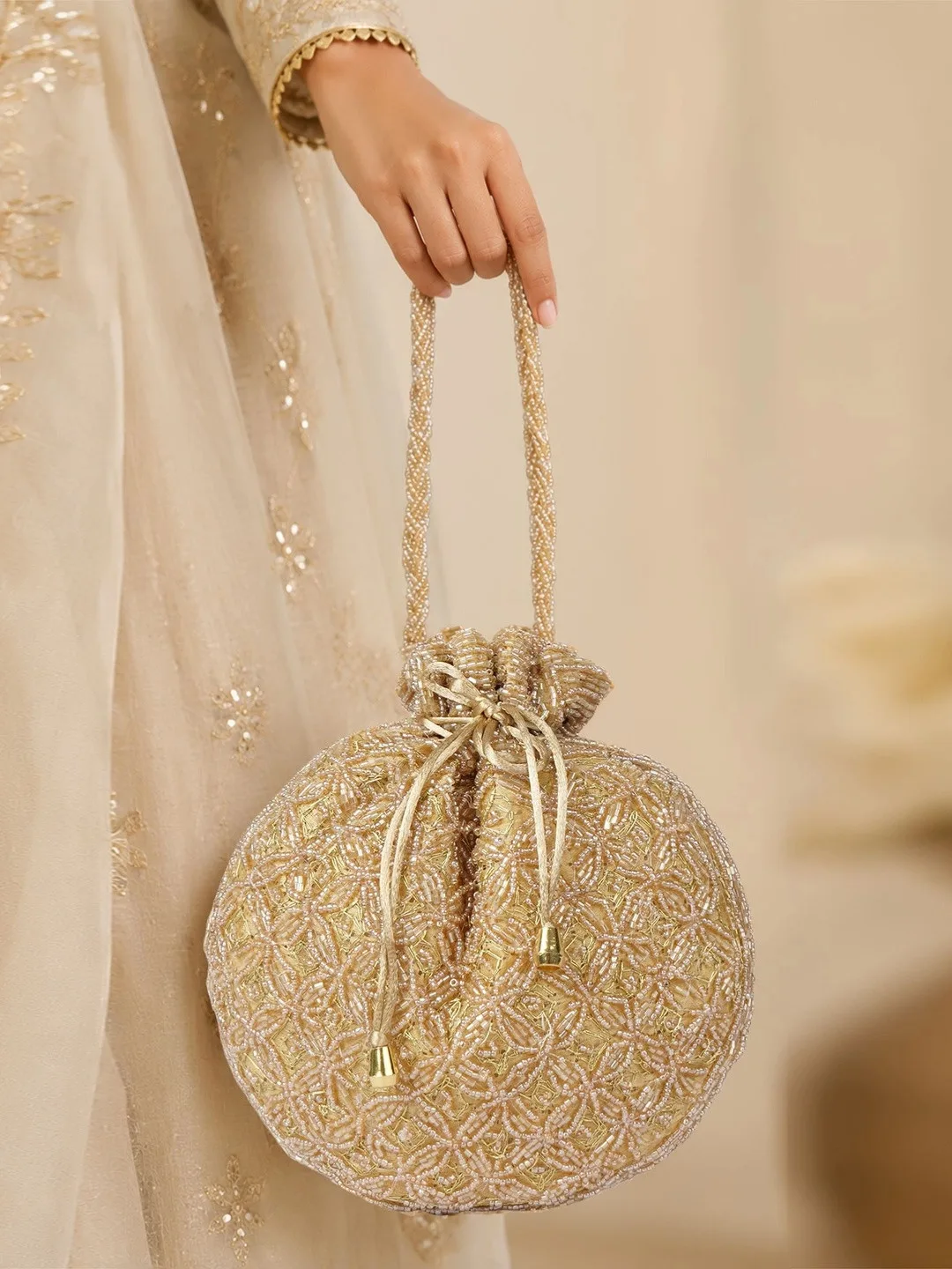 ROLEXO Gold embroidered potli