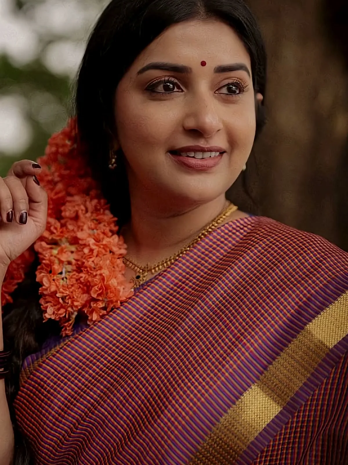 Meera Jasmine — Up close: the fine check and the gold zari band
